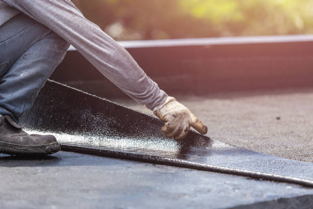 Professional Waterproofing technician working in Waukesha, WI